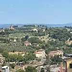 View Over The Rooftops Of Appartement Siena